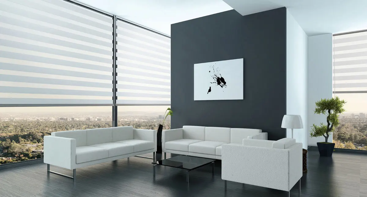 Light blue combi blinds across floor-to-ceiling windows in a bright living room